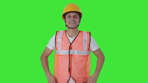 Happy Indian labour getting ready for work Green screen