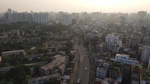 Aerial city road with congested building at morning. Urbanization infrastructure