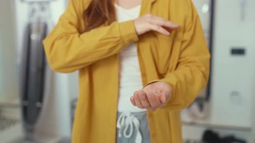 Close Up Hands Woman Spraying Antiseptic Into the House Antibacterial Virus Medical Clean Infection