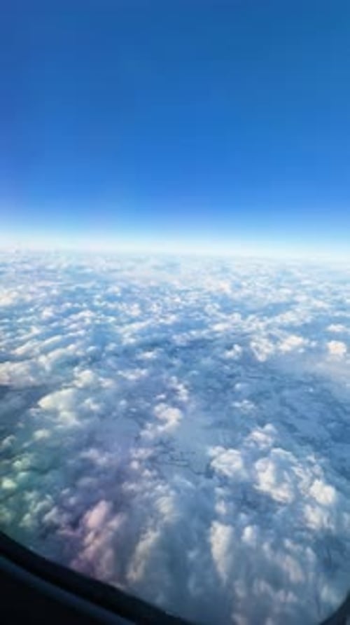 Above Clouds: Stunning Aerial View of Winter Landscape