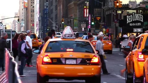 NEW YORK - MAY 19: New York Yellow Cab and Pedestrians, On