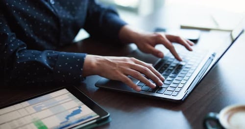 Chart, laptop and hands with business person in office for account bookkeeping