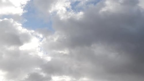 Drifting Clouds in a Blue Sky