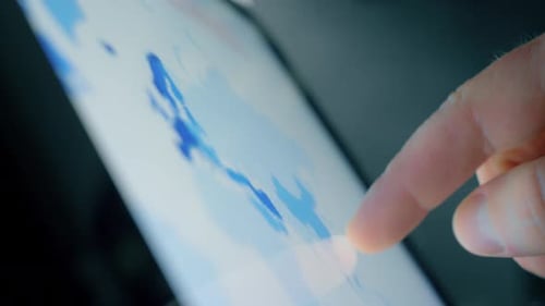 Finger Interacting with a Map on a Tablet