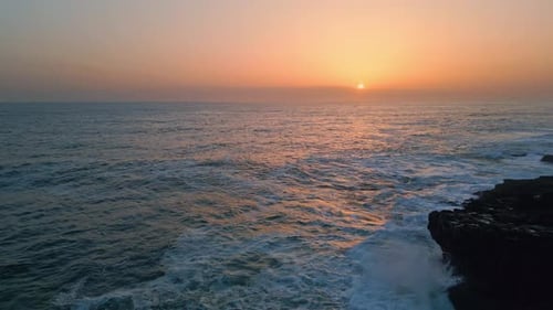 Stormy Sea Sunset Horizon Landscape Slow Motion Foamy Water Crashing Dark Rocks