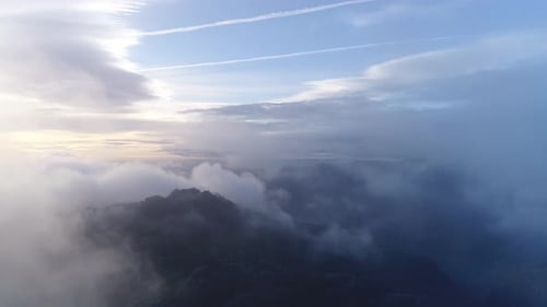Mountain Range Covered in Clouds Aerial View