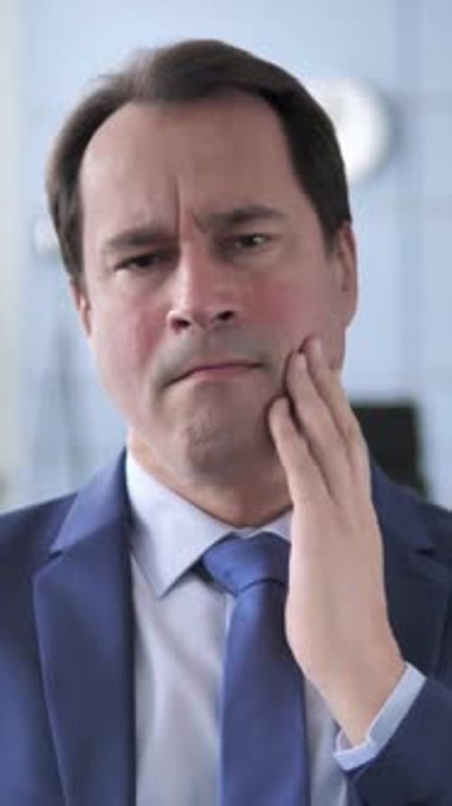 Toothache, Businessman with Tooth Infection, vertical video