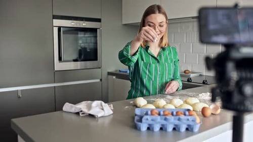 Woman Making Dough in her Kitchen