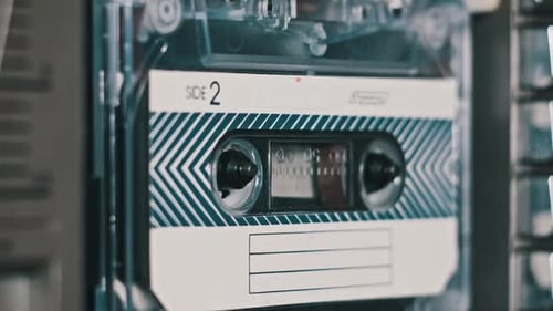 Audio Cassette Tape Playing in Stereo System