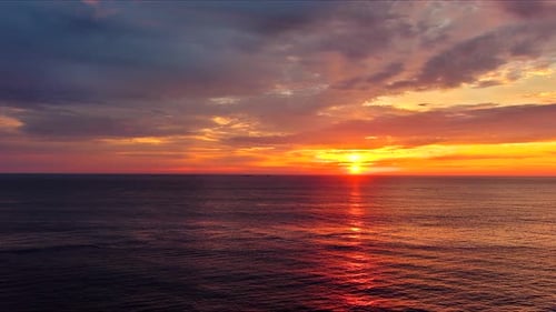 Stunning Sunrise Over Ocean As Sun Rises in Morning