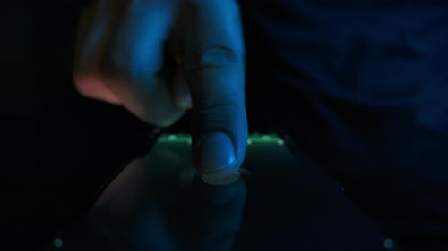 Man Person Activate Id in Fingerprint Scanning on Tech Device Panel Closeup