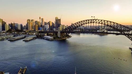 time lapse hyperlapse or drone lapse at Sydney city harbour during sunrise.