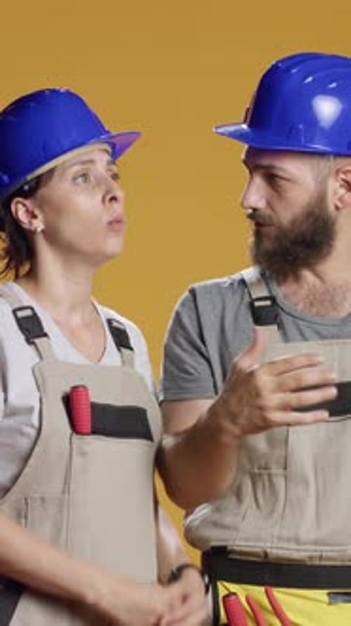 Vertical Video Team of Builders Brainstorming Ideas to Plan Demolition