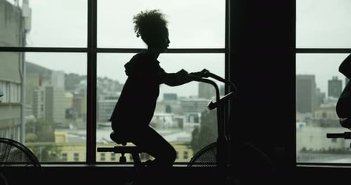 Group, bicycle machine and fitness in gym for workout, commitment and silhouette in sports club