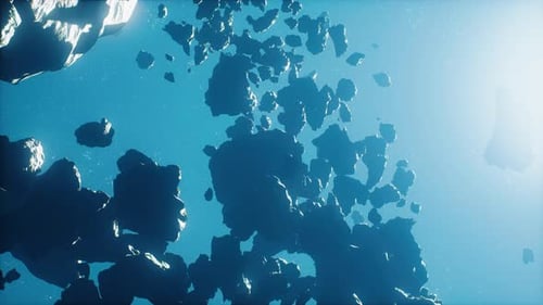 Floating Asteroids in Bright Blue Cosmic Background Motion