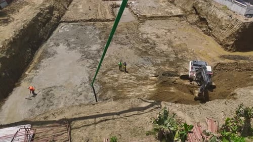 Aerial View Project Kickoff First Concrete Pouring and Machinery Activity