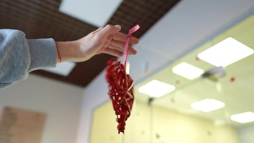 Touching Red Heart Decoration with Woven Strands