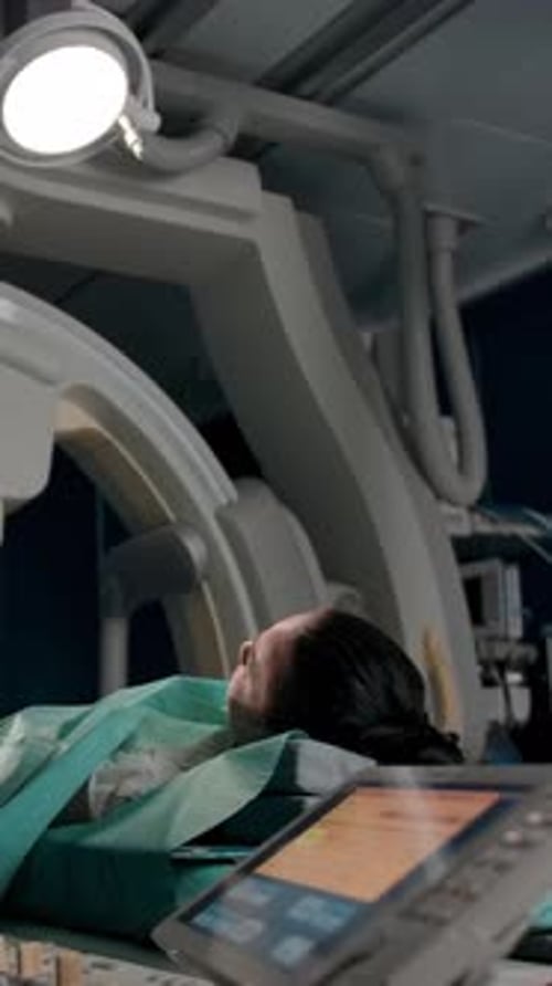 Vertical of Surgeon and Patient in Operating Theater