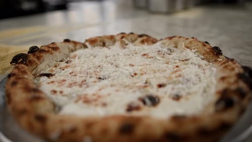 Hot delicious pizza 4 cheeses in the restaurant ready to serve - traditional italian cuisine