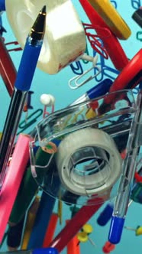 Different School Tools Fly Up and Down Back to School Filmed on a Highspeed Camera at 1000 Fps