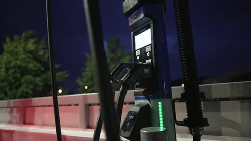 Electric Vehicle Charging Station at Night