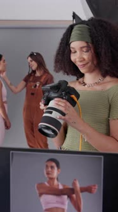 Happy, photographer and woman with camera, creative and smile for photo in studio