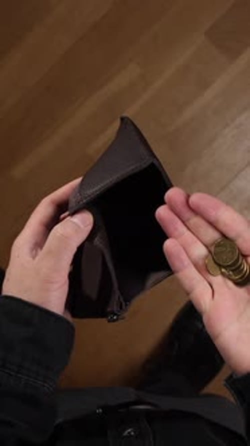 Counting Coins From a Small Brown Wallet