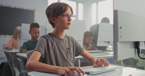 Elementary Students Using Computers in Classroom