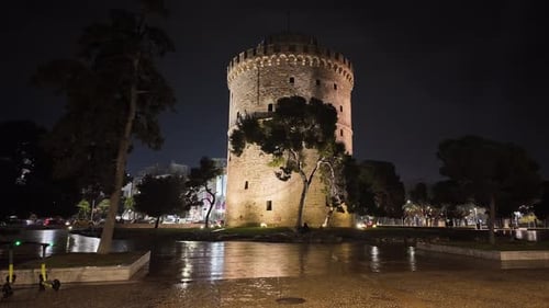 Still Frame of the famous White Tower beautifully lighted at night time.Traffic passing by.No people