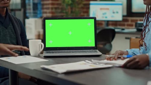 Office Meeting with Laptop Green Screen Display