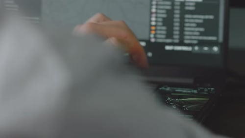 Finger Using Touchscreen Laptop at Workplace