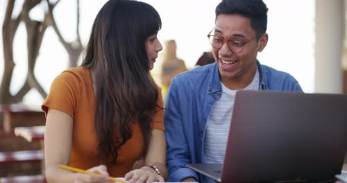 Students, writing in book and studying at university, college or education campus with laptop
