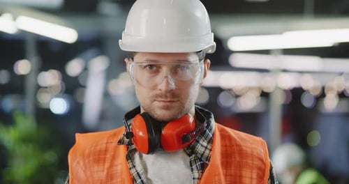 Confident Construction Worker in Safety Gear Close Up