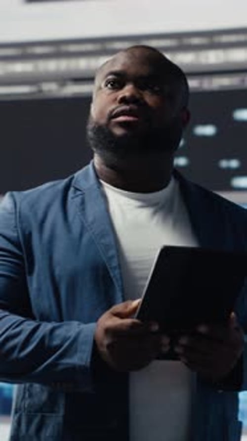 Vertical Video African American Developer Working on Programming and Automation