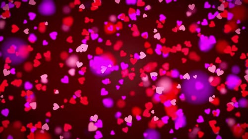 Romantic Falling Hearts Loop with Glowing Particles