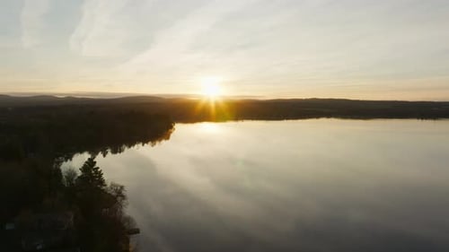 Tranquility Of Lake During Sunrise In The Province Of Quebec In Canada. Aerial Wide Shot