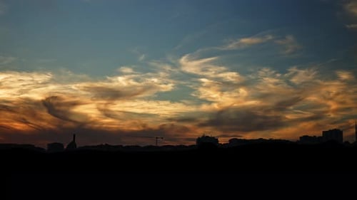 Sunset Clouds Over the City