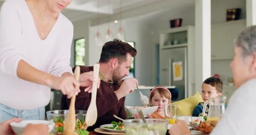 Family Meal with Salad, Indoors at Dining Table