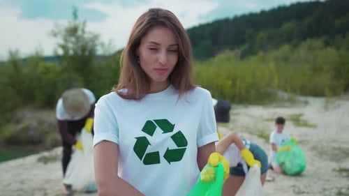 Group Volunteers Cleaning up Beautiful Natural Beach