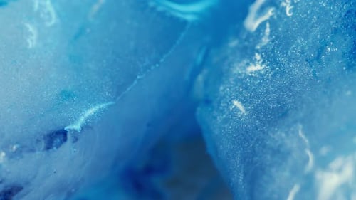 Abstract Blue Liquid Swirls with Glittery Particles