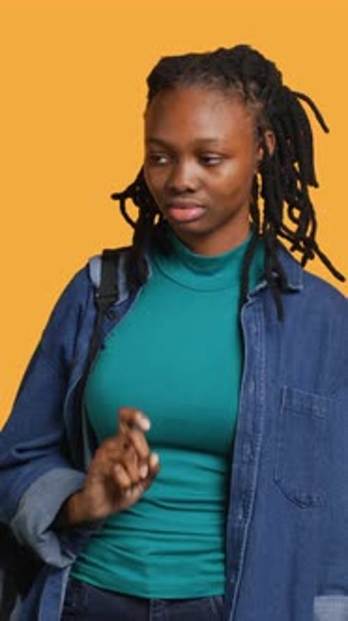 Vertical Video Anxious Student Thinking of Raising Arm to Answer Question Lacking Confidence