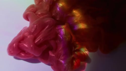 Abstract Red Paint Mixing with Rainbow Light