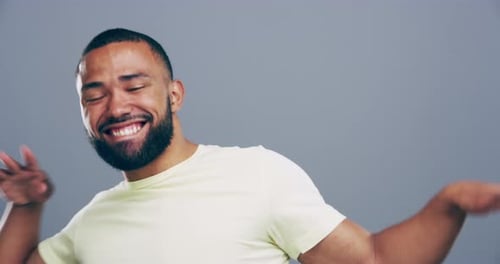 Man Dancing Joyfully in a Close-Up Shot