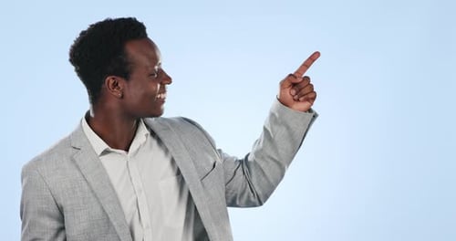 Happy black man, pointing and list on mockup for advertising or marketing against a studio