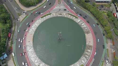 Circundas de trânsito: rotatória Bundaran HI no centro de Jacarta, perto do Grand Indonesia Drone Pull Back
