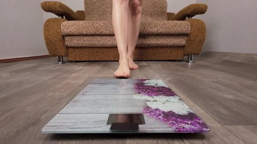 Women on Scales Measure Weight Close Up Female Checking Barefoot Body Overweight Fitness Diet Young