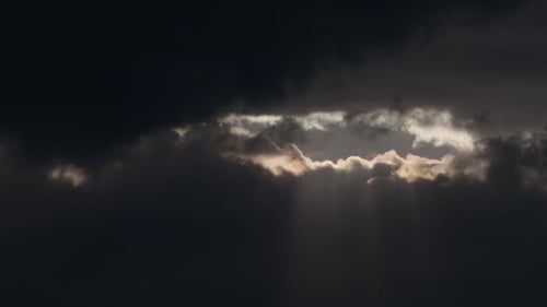 Sun breaking through the rain clouds.