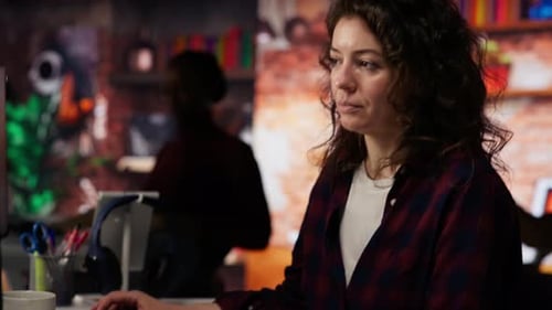 Employee Working in Innovative Startup Office Using Programming Languages