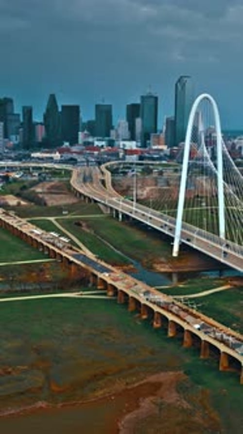 Aerial view of Dallas showcasing city skyline and iconic bridge