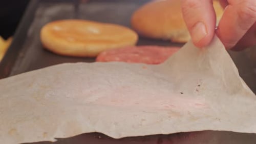 Cooking American Fat Smash Burger on Grill Closeup Beef or Pork Cutlet Smashing By Burger Press The